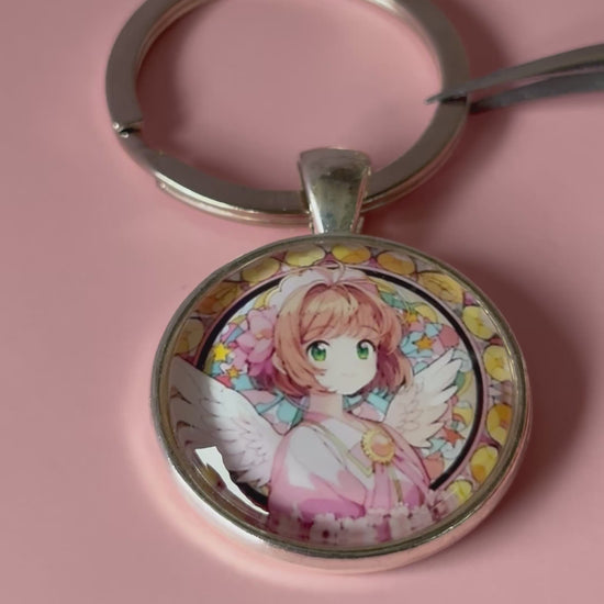 Card Captor Sakura Anime-Schlüsselanhänger mit rundem Motiv und silbernem Metallanhänger