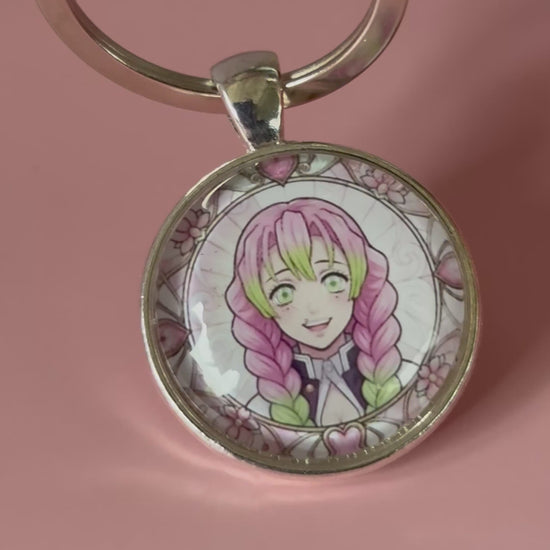 Demon Slayer Anime-Schlüsselanhänger mit rundem Motiv und silbernem Metallanhänger